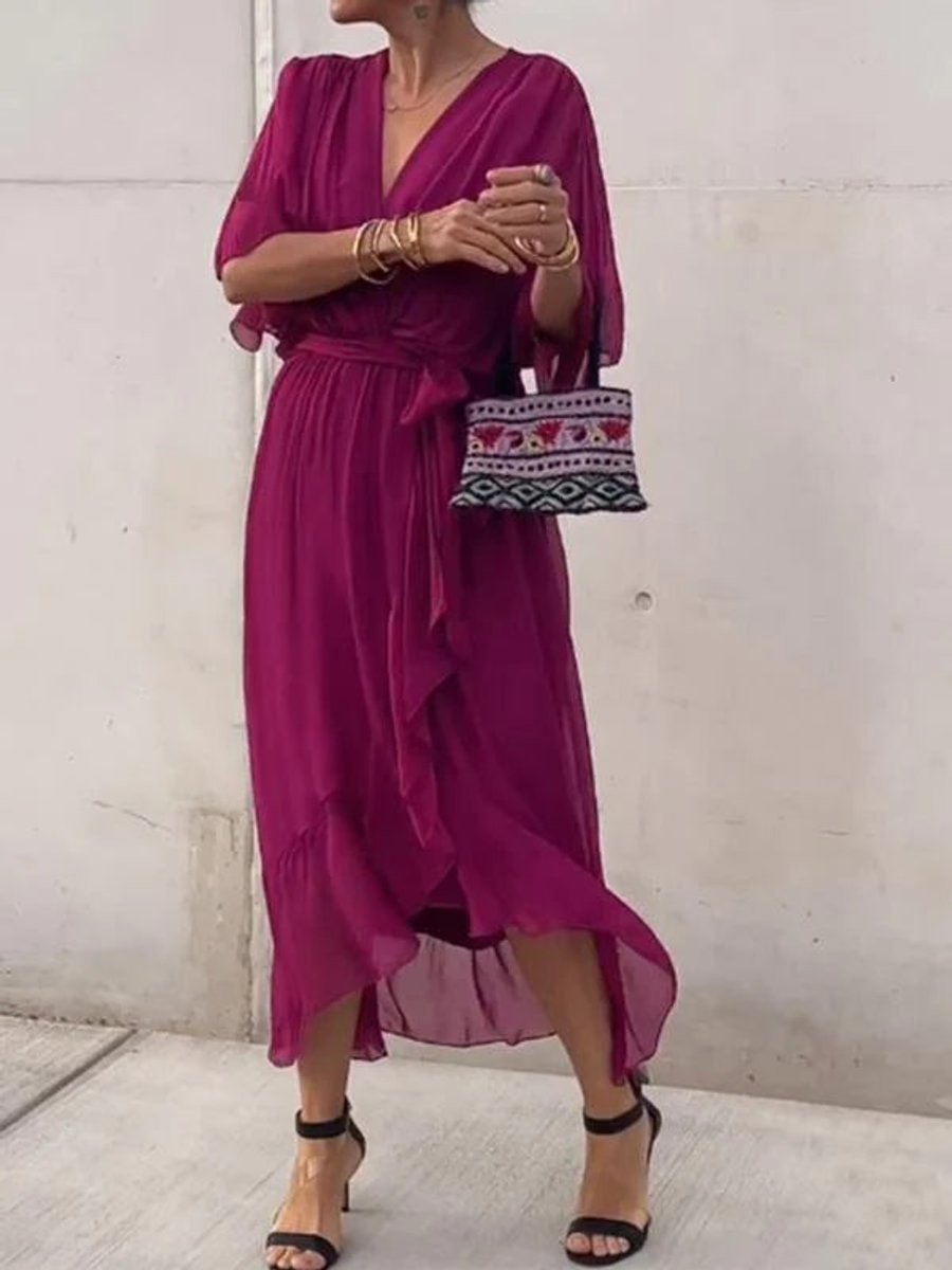 Flowy women's V-neck midi cocktail dress with a belted waist in soft chiffon fabric.