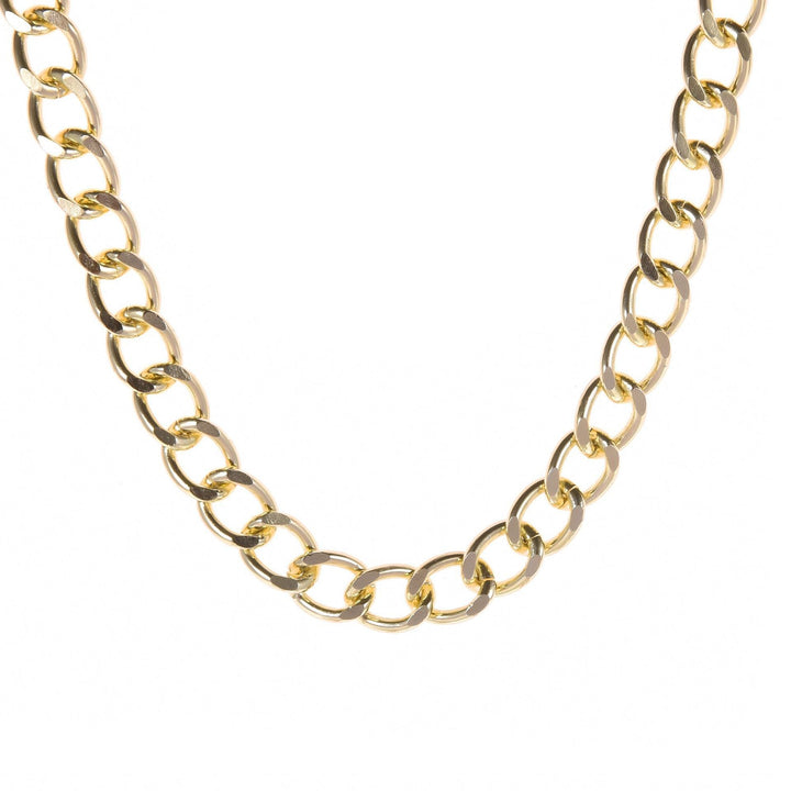 Close-up of a women's chunky gold link chain necklace, perfect as a bold statement piece or fashion accessory.