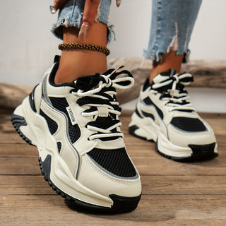 Women's chunky platform panelled sneakers. Trendy lace-up fashion footwear for casual everyday wear.