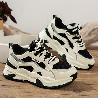 Fashionable women's panelled chunky sneakers. Versatile platform shoes perfect for comfortable everyday wear.