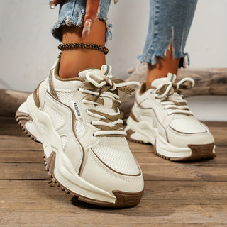 Beige women's chunky platform sneakers with panelled details. Comfortable lace-up fashion footwear.