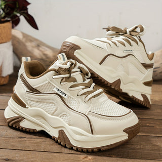 Black women's panelled chunky platform sneakers. Trendy lace-up casual shoes for modern style.