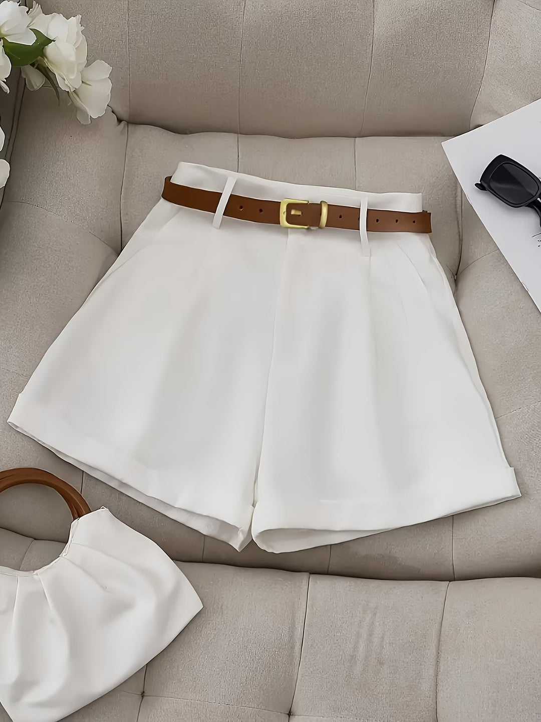 Women's classic belted shorts for effortless everyday style. Comfortable and versatile tailored ladies' fashion for summer.