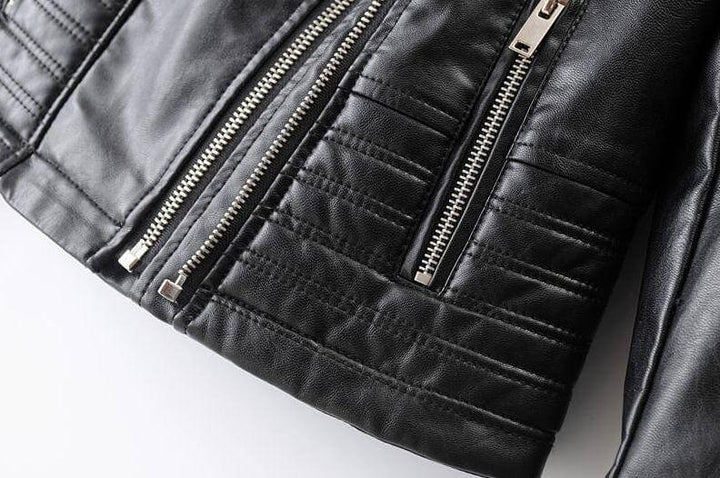 Stylish women's asymmetrical biker jacket in black, a classic piece for year-round edgy fashion.