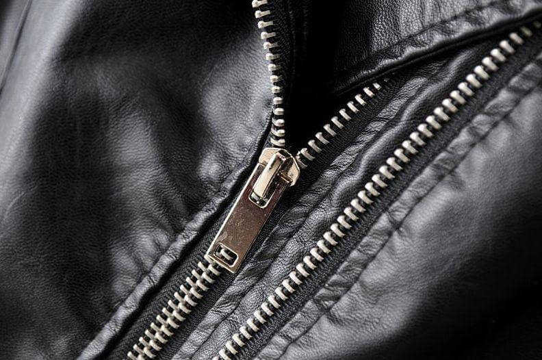 Black women's classic biker jacket, offering an edgy yet versatile style; essential fashion outerwear.