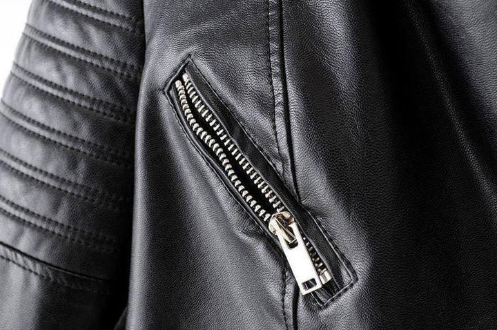 Women's classic style biker jacket, black, with unique asymmetrical details and durable construction.