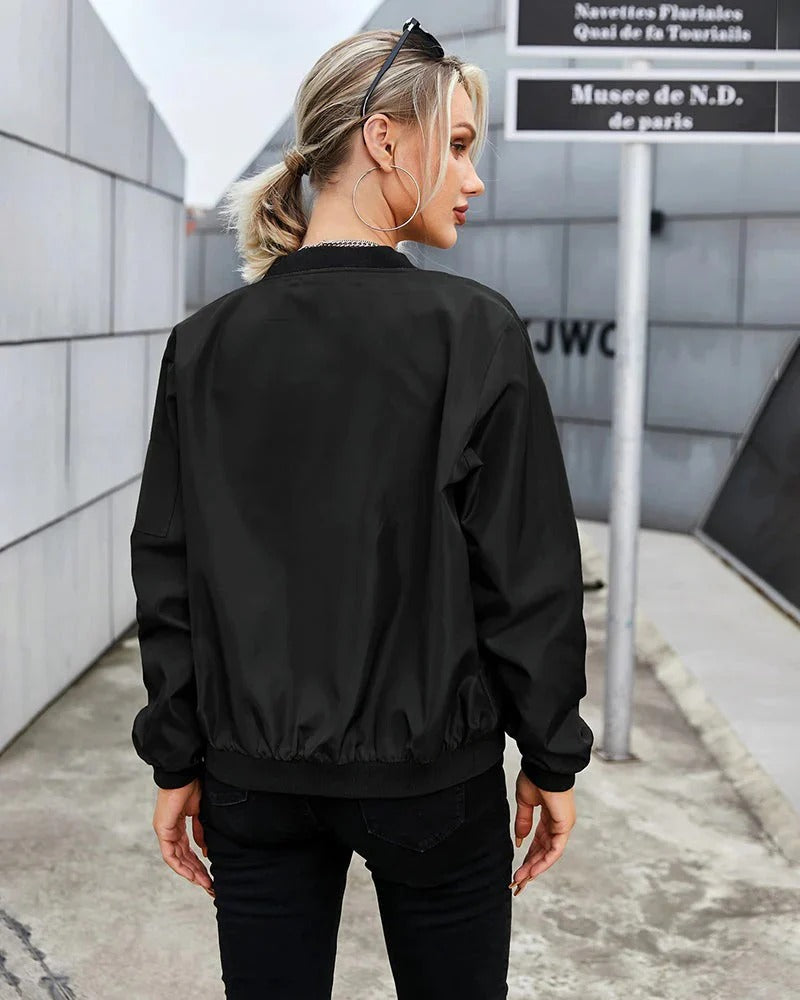 Comfortable women's classic bomber jacket, ideal for spring & fall. Stylish seasonal zip-up outerwear.