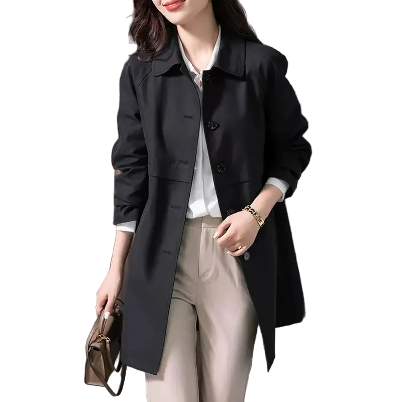 Stylish women's short black trench coat, a versatile transitional jacket perfect for effortless fashion.