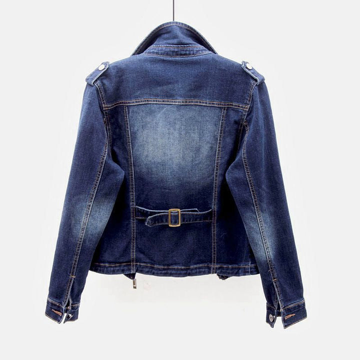 Classic fit women's blue denim jacket, a timeless fashion piece. Versatile outerwear for everyday style.