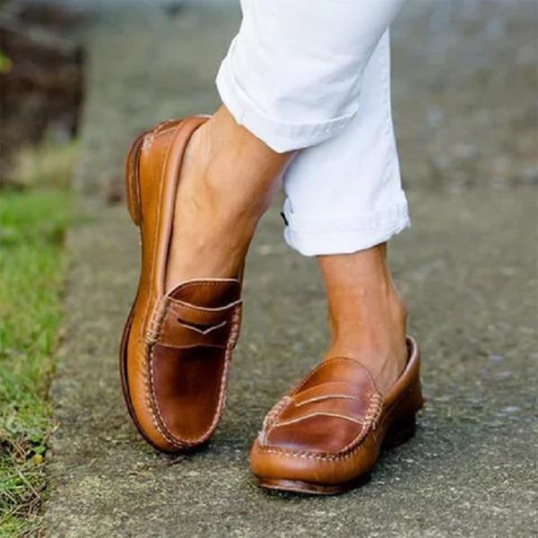 Women's classic brown leather penny loafers with orthopedic support, perfect for comfortable everyday wear & work.
