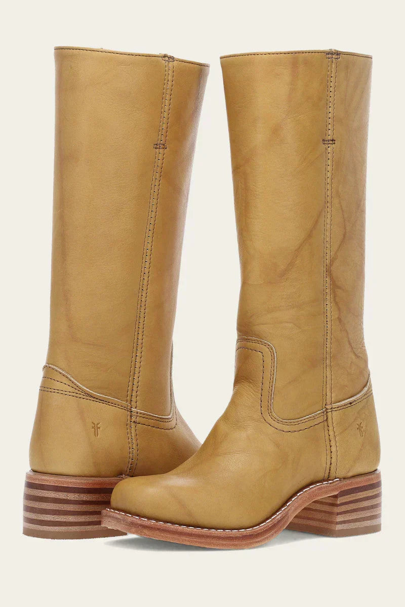 Women's classic brown western cowboy boots with pointed toe & angled heel for timeless style.