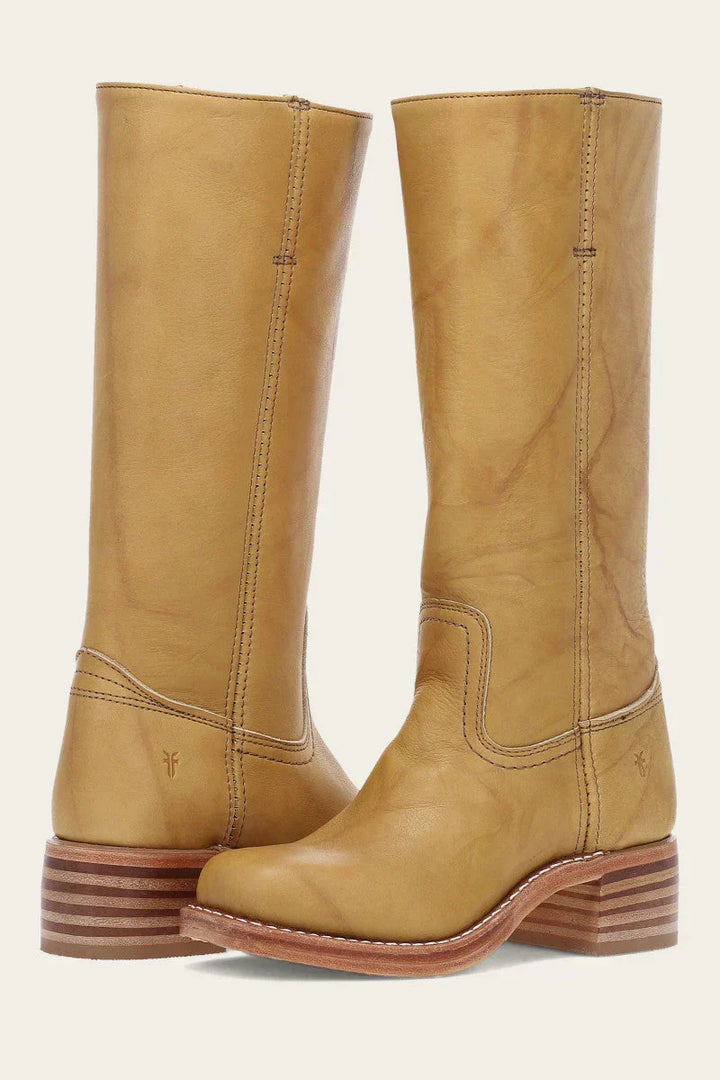 Women's classic brown western cowboy boots with pointed toe & angled heel for timeless style.