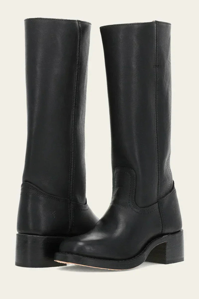 Modern black women's cowboy boots with pointed toe & angled heel. Perfect festival footwear.