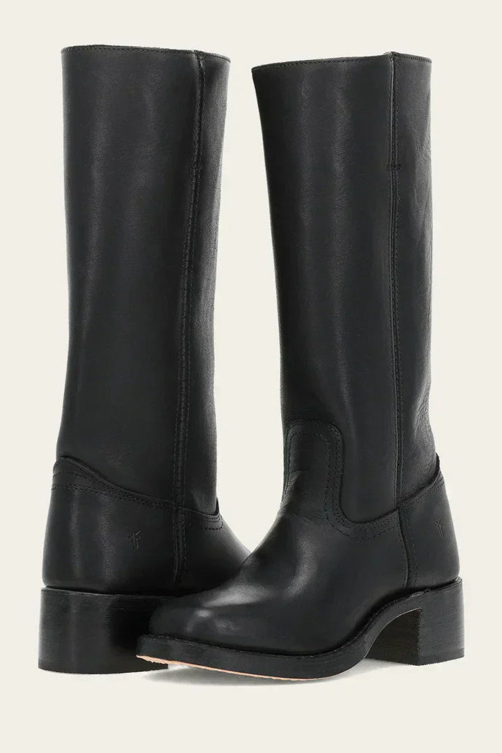 Modern black women's cowboy boots with pointed toe & angled heel. Perfect festival footwear.
