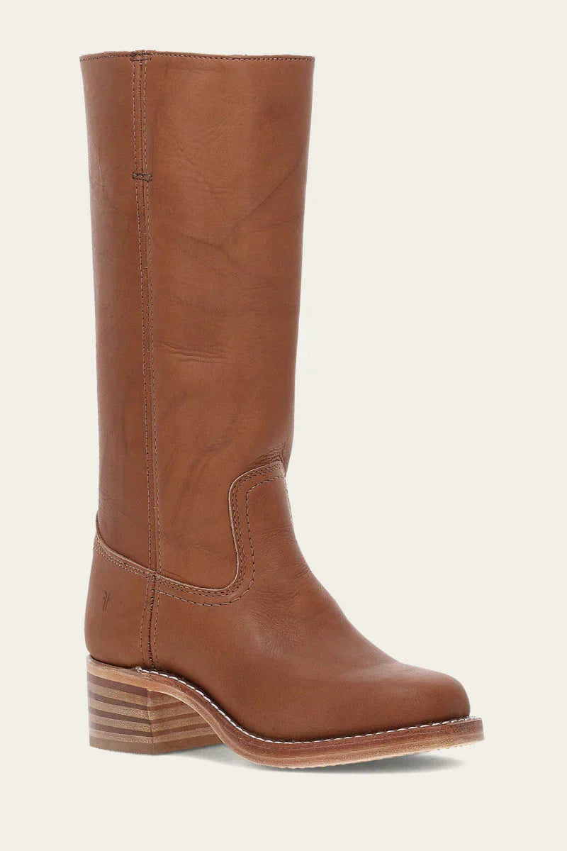 Fashionable brown western boots for women, designed with a chic pointed toe & sturdy angled heel.