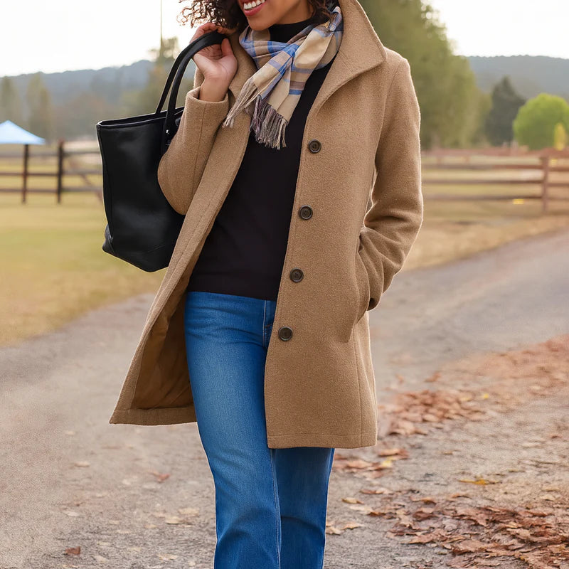 Elegant women's longline coat, perfect for autumn & winter fashion. Classic button-up design.