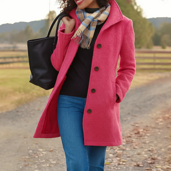 Sophisticated women's long button-up coat. An elegant autumn essential with a timeless design.