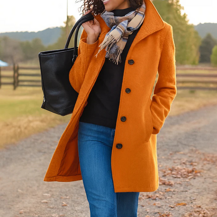 Timeless classic button-up longline coat for women. Elegant & versatile sophisticated outerwear.