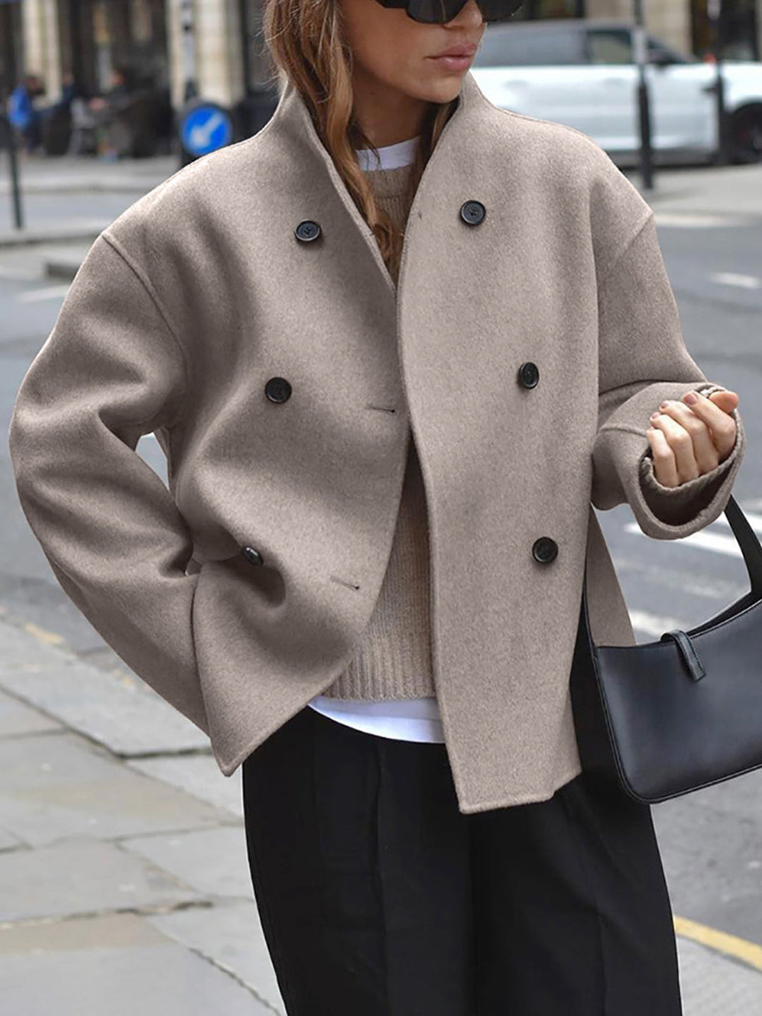 Women's classic double-breasted pea coat for elegant warmth. Perfect winter outerwear.