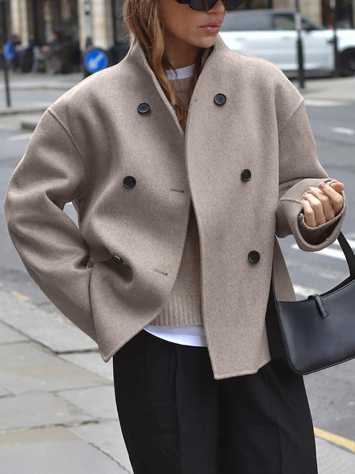 Women's classic double-breasted pea coat for elegant warmth. Perfect winter outerwear.
