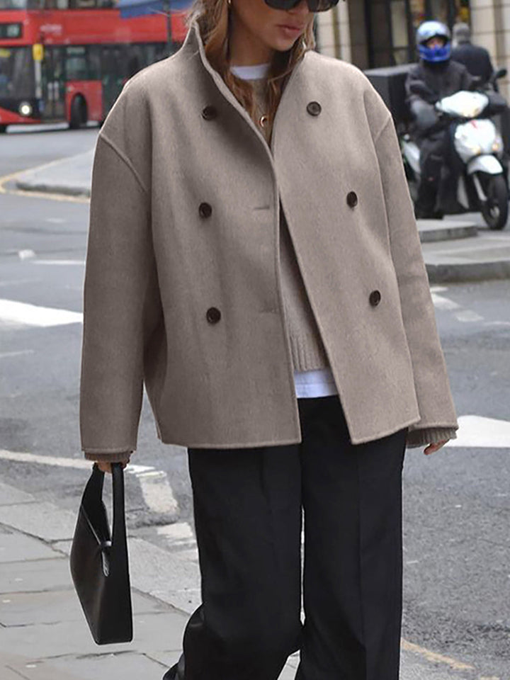 Warm women's classic pea coat. Double-breasted design, perfect for elegant fall & winter style.