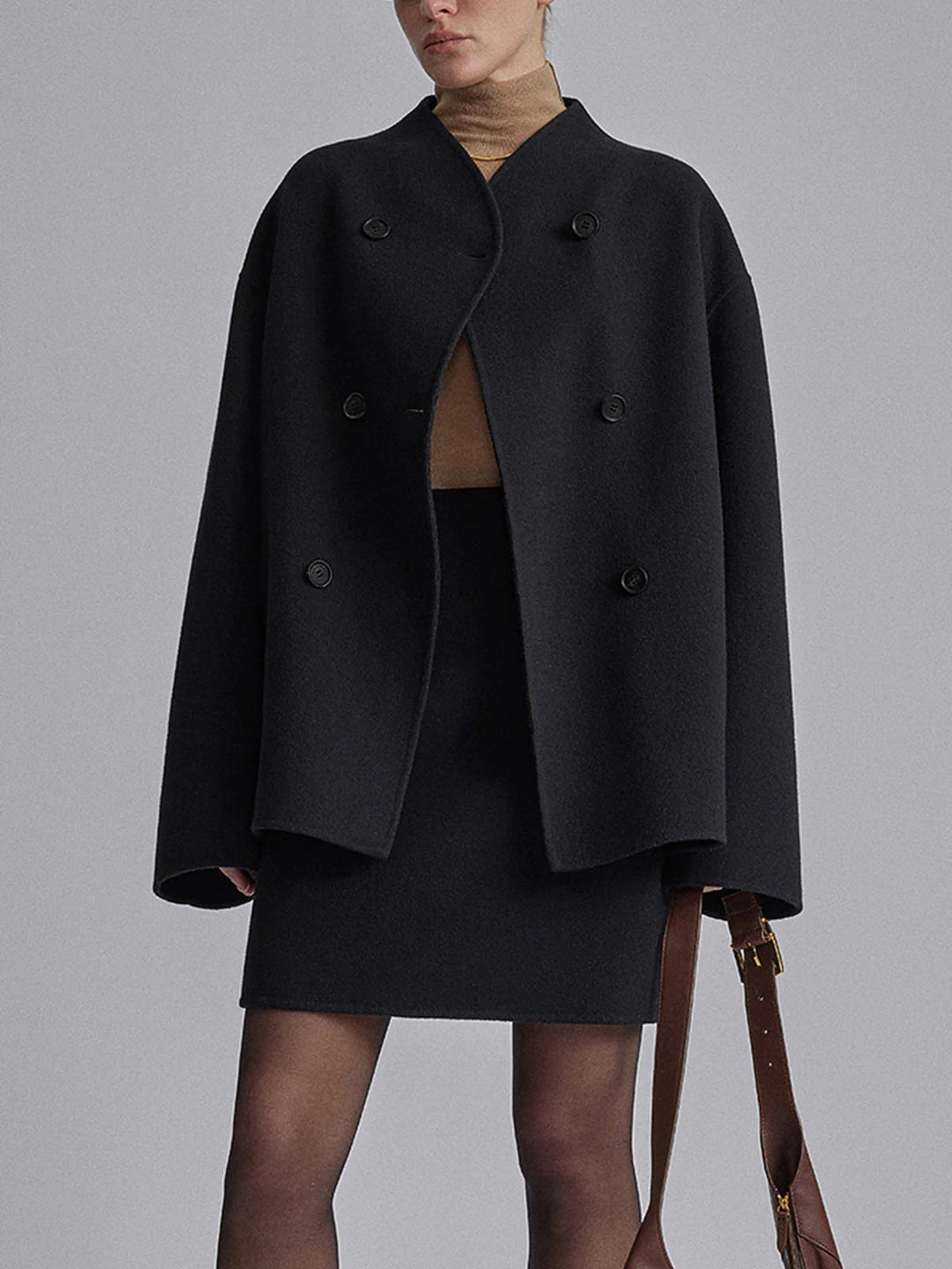 Fall fashion women's pea coat. Double-breasted, stylish & warm, ideal for elegant winter outfits.