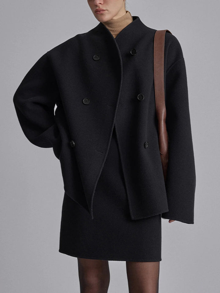 Women's warm pea coat jacket. Double-breasted classic style for elegant and comfortable winter outerwear.