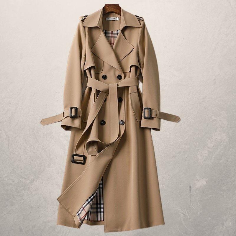 Fashionable women's outerwear: a classic double-breasted trench coat with belt for autumn style.