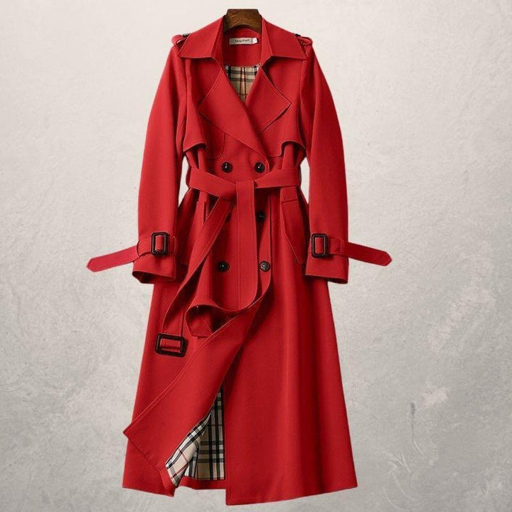 Women's double-breasted long trench coat featuring a belt, perfect for classic spring/fall layering.