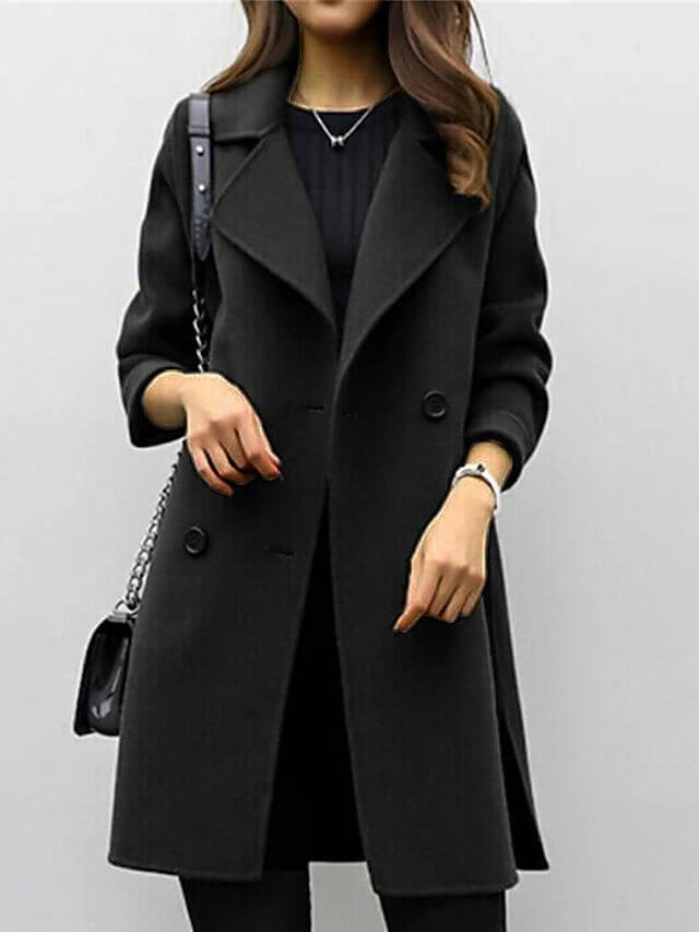 Chic women's classic double-breasted winter jacket. Elegant outerwear perfect for a sophisticated cold-weather style.