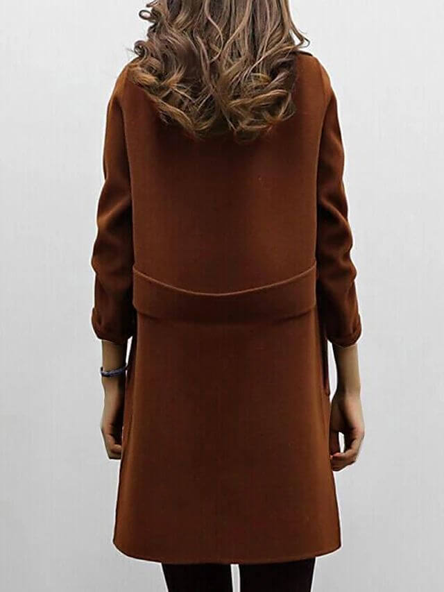Elegant women's double-breasted winter coat. Classic long-sleeve jacket, chic and warm outerwear for women.