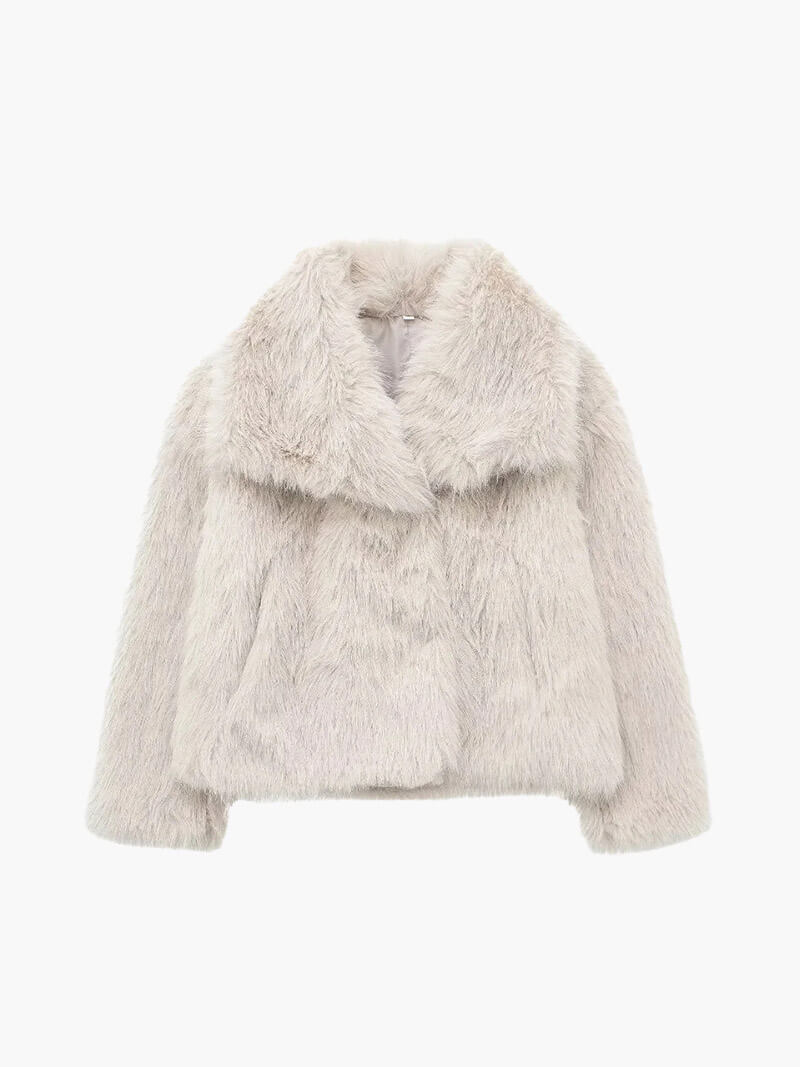 Women's classic faux fur coat with wide lapel collar. Elegant and cozy winter jacket for chic cold weather style.