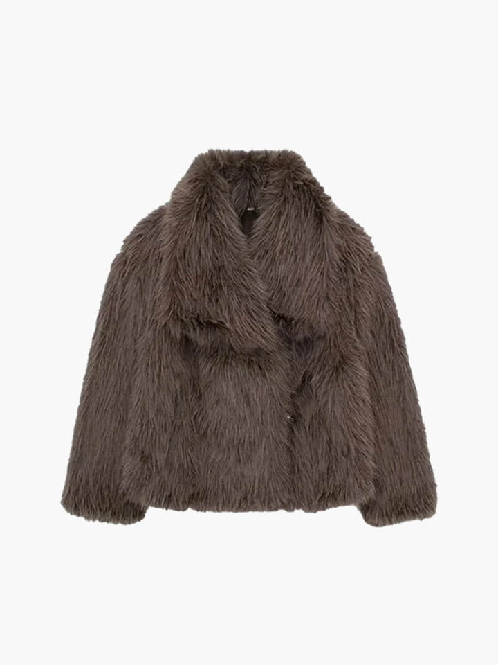 Cozy women's faux fur coat. Fashionable and chic wide lapel winter outerwear, ideal for elegant cold weather.