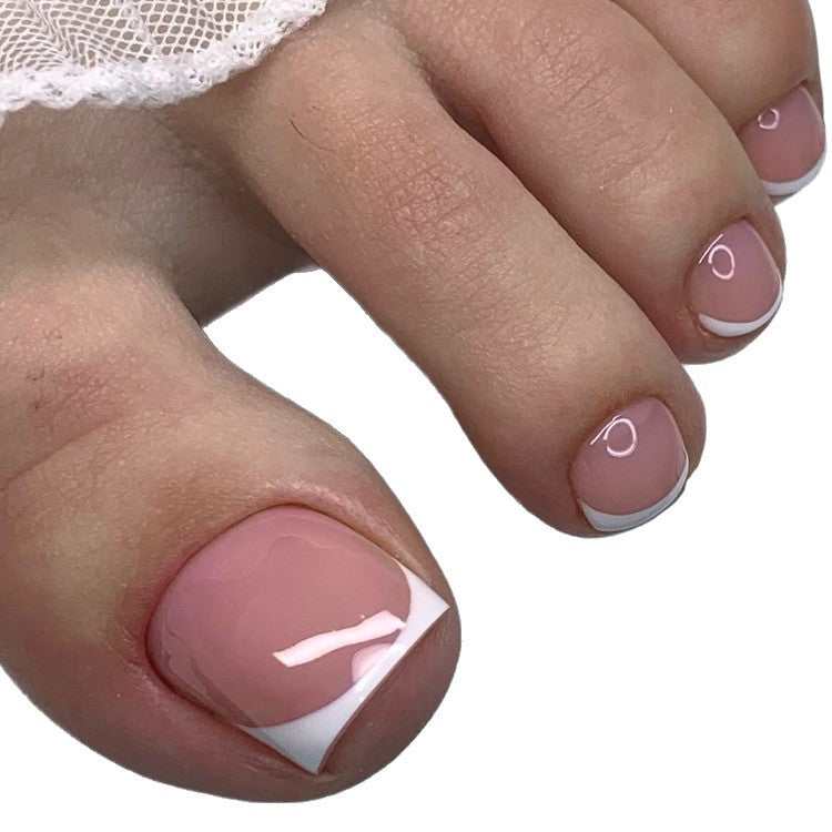 Complete gel nail art kit for women's classic French tip designs. Includes everything for DIY elegant nude pink manicures.