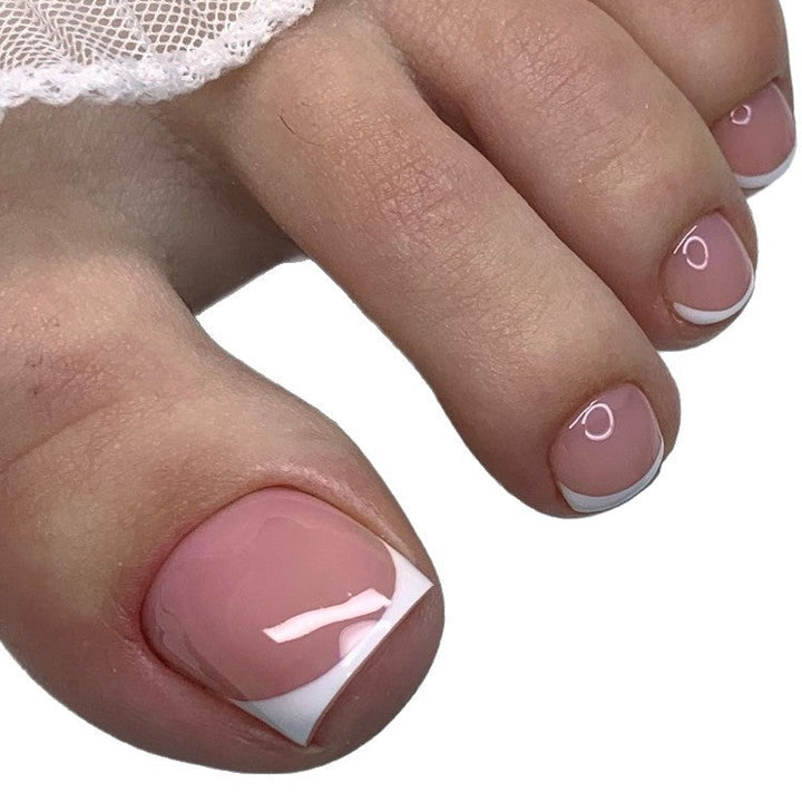 Complete gel nail art kit for women's classic French tip designs. Includes everything for DIY elegant nude pink manicures.