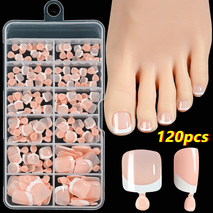 Classic French tip press-on toenails, an elegant and easy nail art set for women's DIY pedicures.