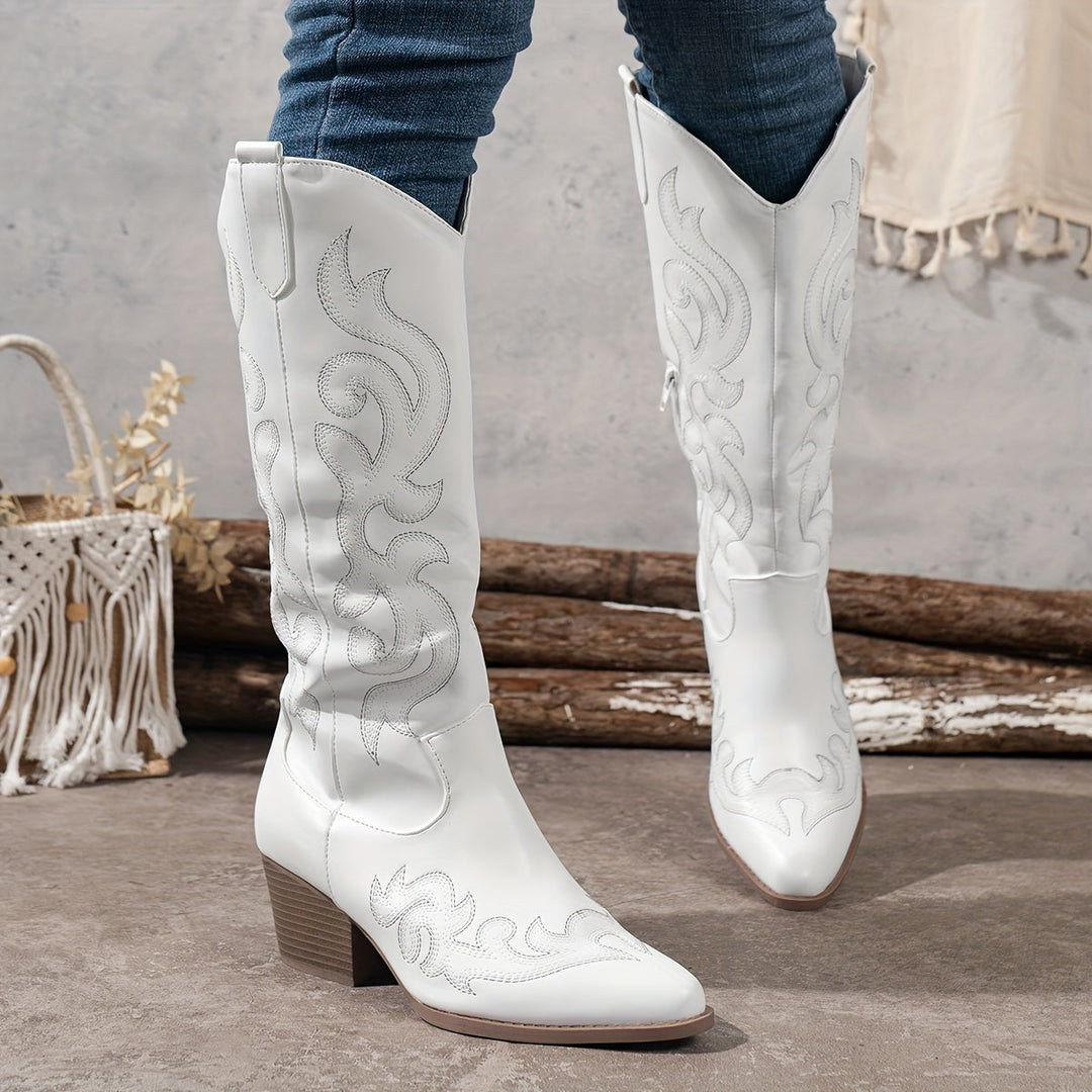 Knee-high western boots for women, classic cowboy design with a chic pointed toe.