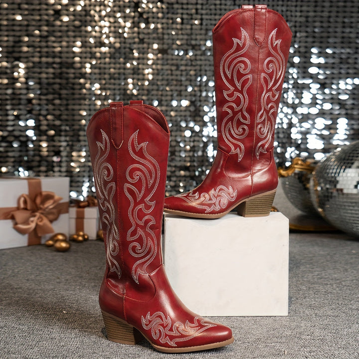Women's stylish cowboy boots, knee-high, featuring a distinct pointed toe & block heel.