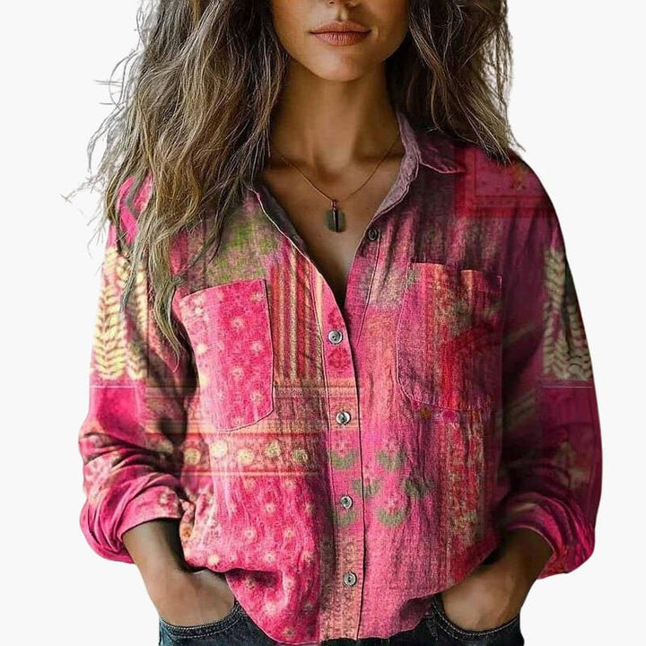 Crisp women's long sleeve button-down blouse, a chic and versatile top for various occasions.