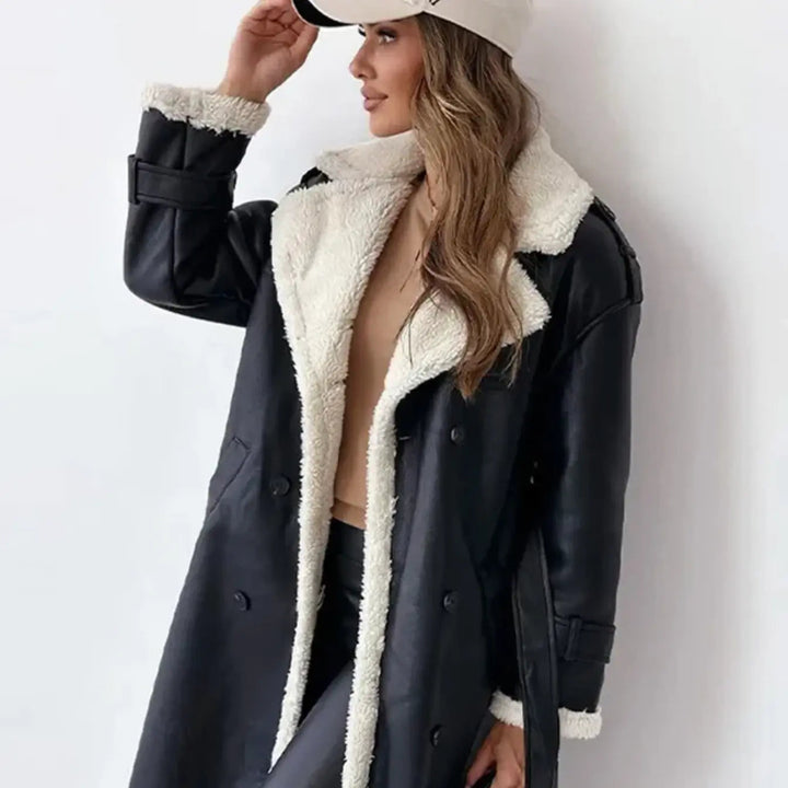 Cozy women's long winter coat with a soft teddy collar, providing ultimate warmth & classic style.