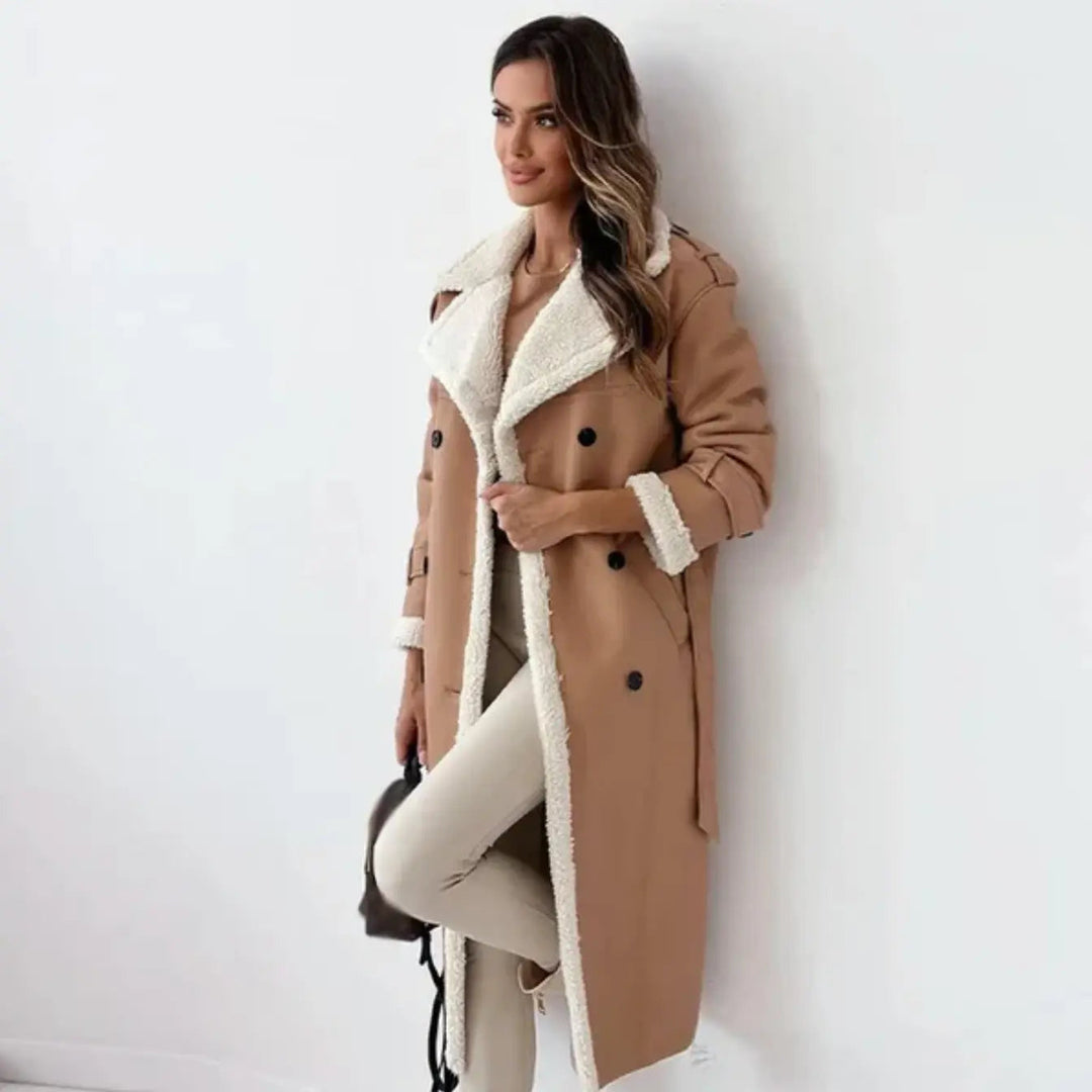Elegant women's long coat featuring a stylish teddy collar, perfect outerwear for classic winter fashion.