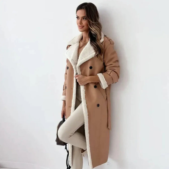 Elegant women's long coat featuring a stylish teddy collar, perfect outerwear for classic winter fashion.