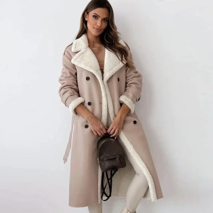Stylish women's long coat showcasing a luxurious teddy collar, designed for winter warmth & fashion.