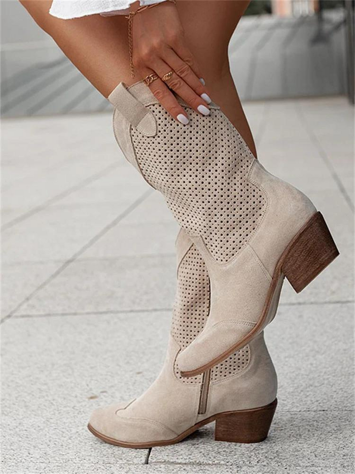 Comfortable women's mid-high cowboy boots, perfect for versatile western fashion, featuring a convenient side zipper.