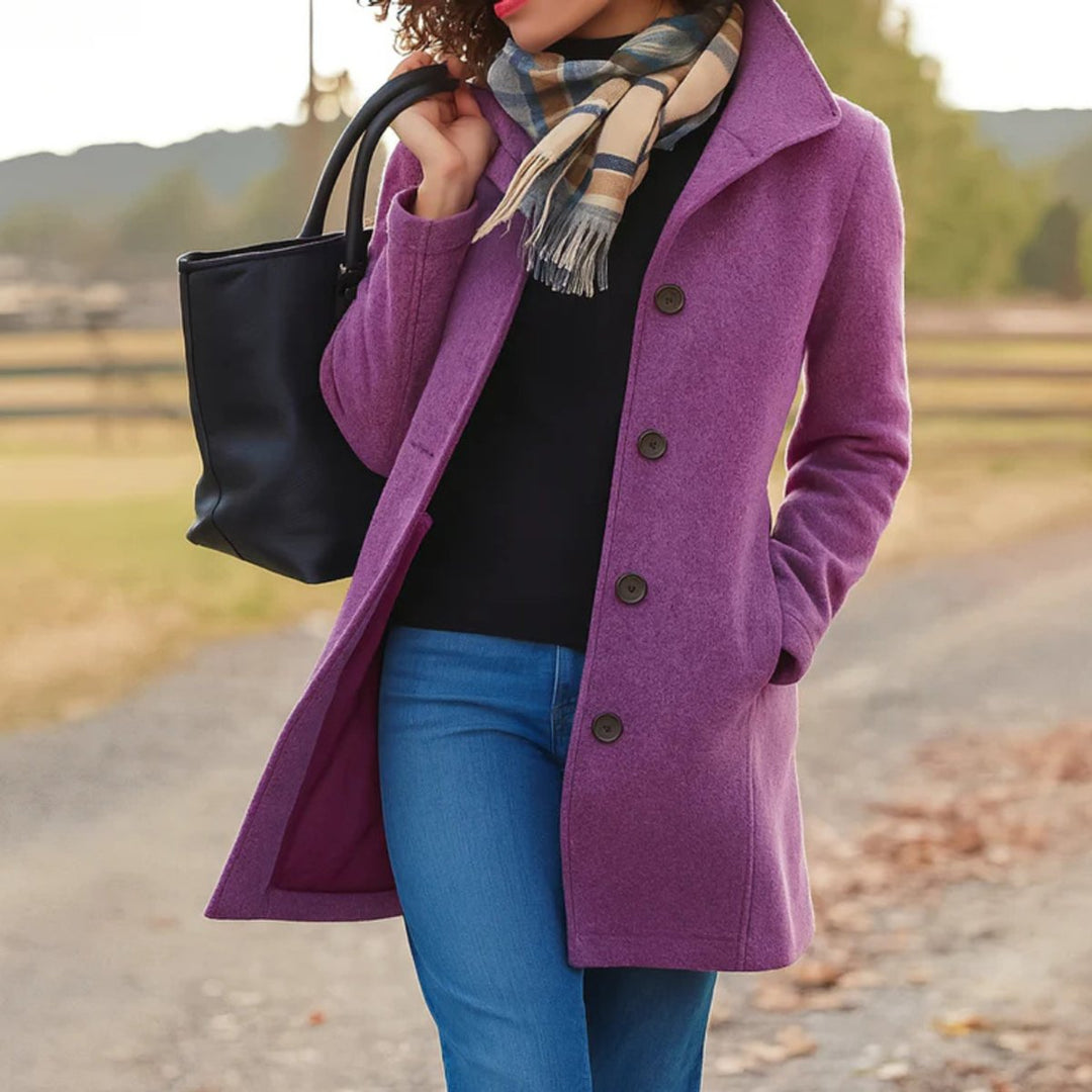 Stylish women's mid-length winter coat with a button-up front, offering classic elegance and warmth.