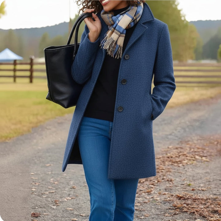 Women's elegant classic mid-length coat with stand collar & long sleeves, a sophisticated button-front design.