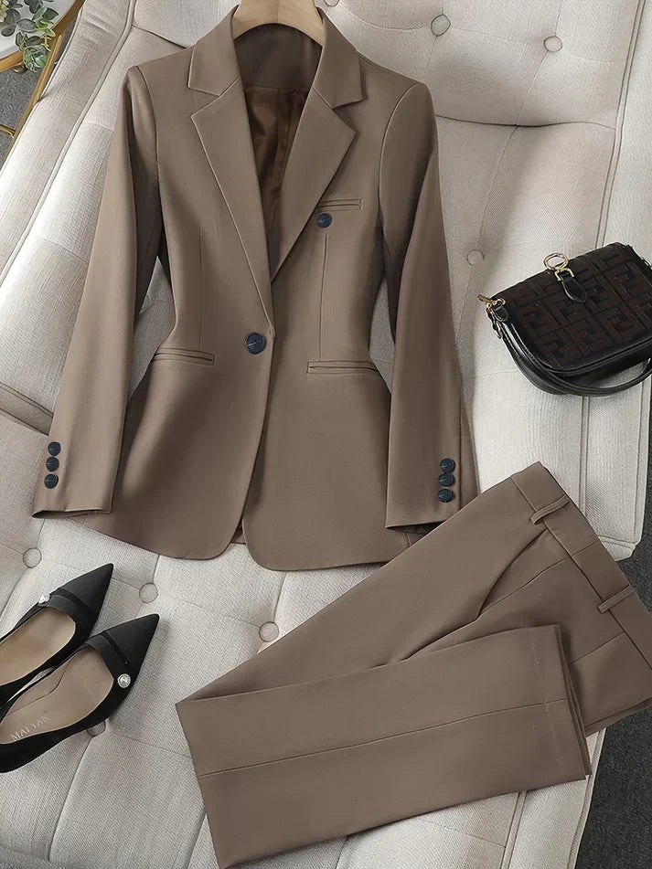 Women's classic notched lapel blazer set with matching tailored trousers, ideal for business attire & workwear.