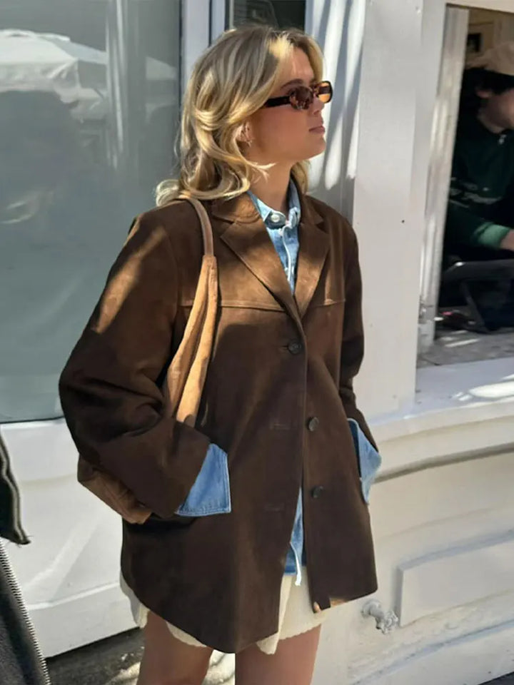 New women's classic outerwear jacket in a versatile design, offering timeless style and comfort.