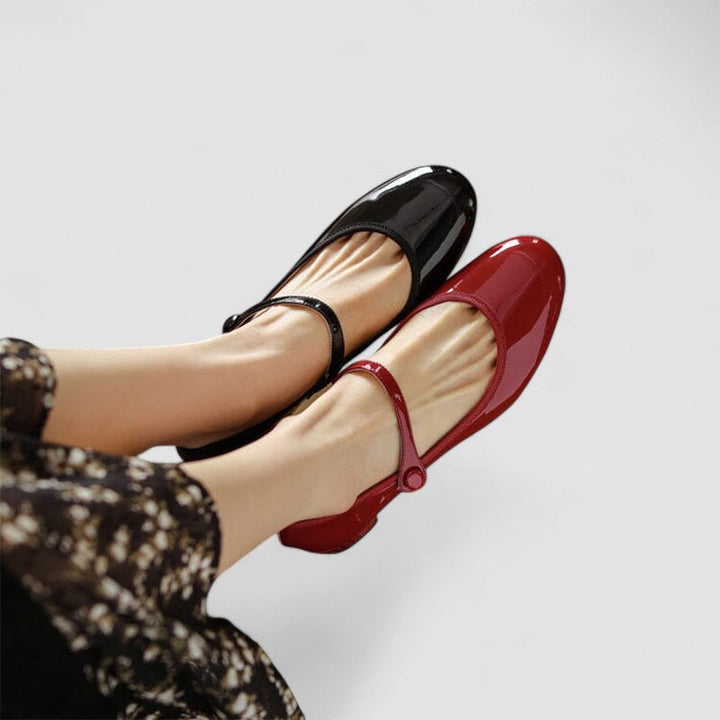 Classic women's patent Mary Jane block heels, ideal for formal, office, or everyday elegant wear.
