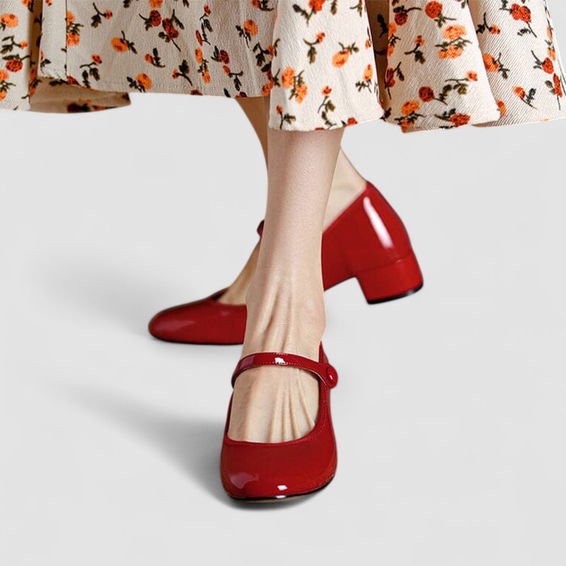 Comfortable women's patent Mary Jane heels with a stable block heel, rounded toe, and secure strap.